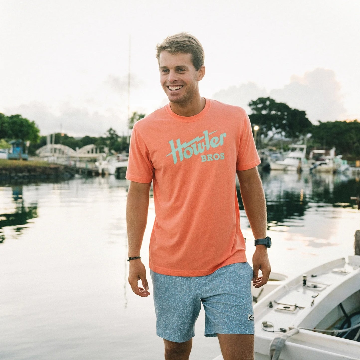 Howler Bros Men's T-Shirt Howler Electric Coral Heather